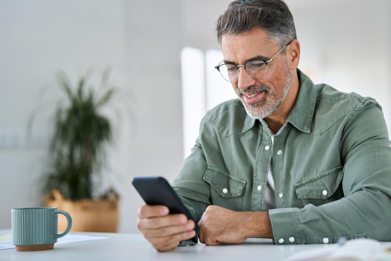 man banking on phone