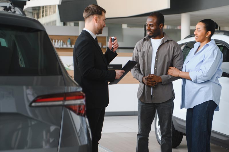 couple buying car